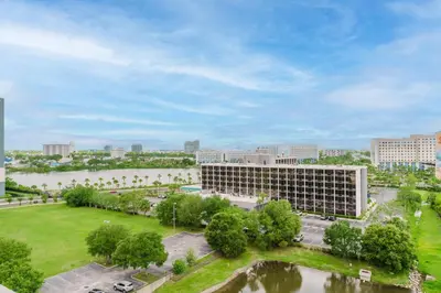 an aerial view of a building with a park at Cozy Apartment at The Point in Orlando