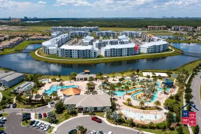 an aerial view of the pool at a resort at Lake View Condo with Resort in Kissimmee