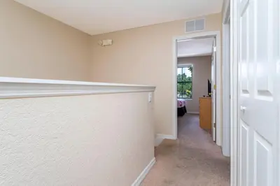 a hallway of a home with a hallway at Central House Near Disney in Orlando