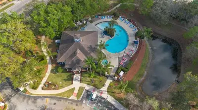an overhead view of a swimming pool at a resort at Casa 4Q c/ Piscina e Padaria – Perto da Disney in Kissimmee