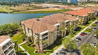 an overhead view of an apartment building with a river at Upstay Newly Renovated Family Retreat Home Near Epic Universe in Orlando