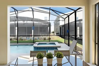 a view from the balcony of a house with a swimming pool at Casa 6Q c/ Piscina & Quartos Temáticos in Kissimmee