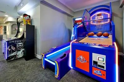a childs room with an arcade video game at Disney Dream in Orlando