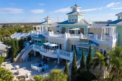 an aerial view of a large white building with a staircase at 321 PC - Encore Oasis Luxury 5BR Home Private Pool in Orlando