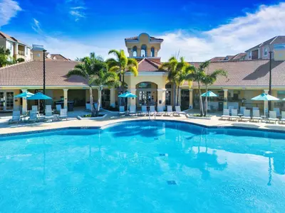 a large swimming pool in front of a hotel at WOW Huge Stunner Corner in Orlando