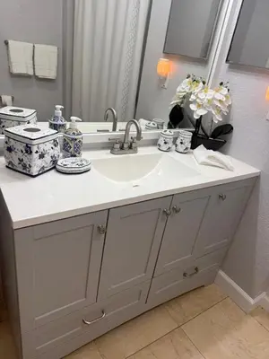 a bathroom counter with a sink and a mirror at Luxury house in Disney in Kissimmee