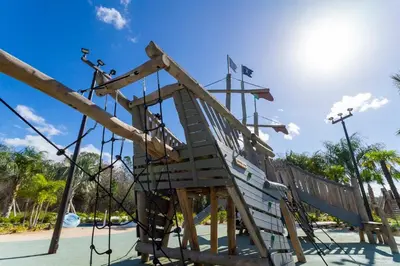a slide at a park with the sky in the background at 9 MI to Disney w Pool Cinema & FREE Waterpark in Kissimmee