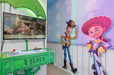 a cartoon of a man and a woman in a room at Mansão 9Q Paradiso Grande. Piscina, Sala de Jogos in Orlando