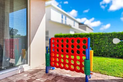 a colorful lego fence in front of a window at Fun-Filled Getaway With Private Pool, Theme Rooms & Game Room And Waterpark Access Near Disney At Encore Resorts Reunion - 7604Mc in Orlando