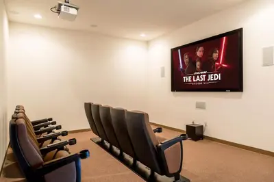 a waiting room with a flat screen tv on the wall at Family-Friendly Apartment Near Disney & Universal in Kissimmee