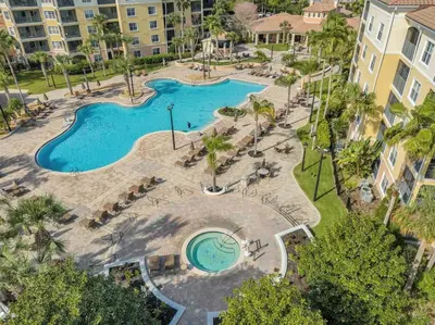 an overhead view of a swimming pool at a resort at Family-Friendly 3-Bedroom Condo for 6 and 5 min to Disney in Orlando