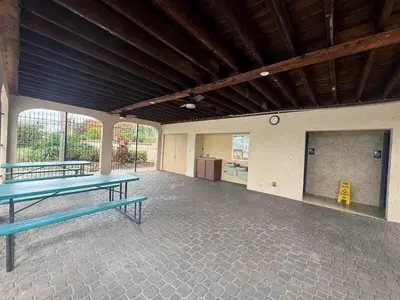 a large room with two ping pong tables in it at Sunny Orlando Oasis - Cozy 2 Bedroom house near Disney in Kissimmee