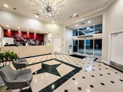 a lobby with a star on the floor at Flats moderno 4min da Universal - The Point Orlando in Orlando