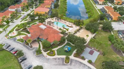 an overhead view of a house with a pool at 4BR Lake View Home Bella Vida in Kissimmee