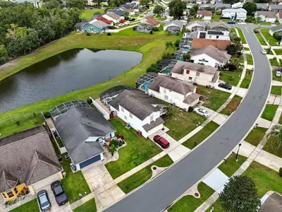 an aerial view of a small town with houses and a road at 10 min to Disney | Karaoke | Game in Kissimmee