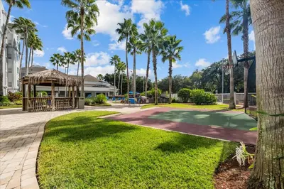 a park with palm trees and a gazebo at Suite near Disney, free parking and shuttle to Parks in Orlando