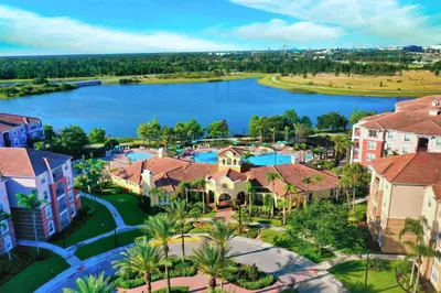 an aerial view of a resort with a lake at The Epic Barcelona Penthouse Vista Cay Orlando Florida in Orlando