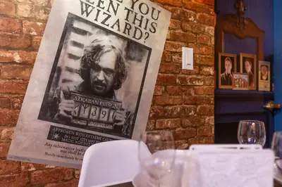 a sign that says when you were greeted at a table at Wizard Themed Suite near Universal and Epic in Orlando