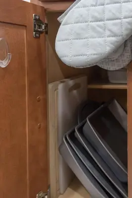 an open drawer in a room with a bed at Jacuzzi and Games Close to Dwtn Disney and Parks in Orlando