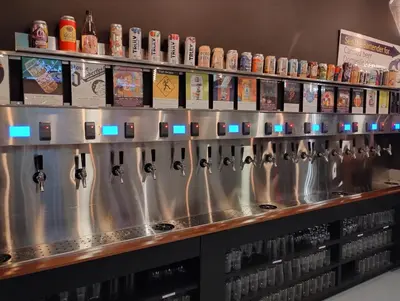 a bar with lots of stainless steel mixing bowls at Kapp and Kappy Bed & Breakfast in Kissimmee