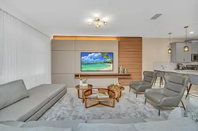 a living room with a couch and a table at Mahuna Matata in Kissimmee