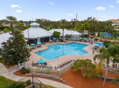 an aerial view of a pool at a resort at Mickeys Villa in Kissimmee