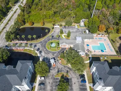 an aerial view of a park with a pool at Themed 2BR Condo Near Disney + Resort Amenities in Kissimmee