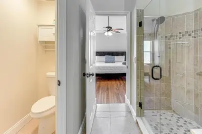 a bathroom with a shower and a toilet at Apopka Family Home with Yard, 13 Mi to Dtwn Orlando in Orlando