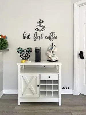 a white table with a coffee sign on a wall at Oakwater Lookout condo in Orlando