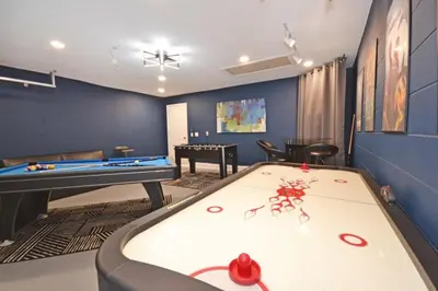 a play room with a pool table and a billiards at Villa Tropics villa in Orlando