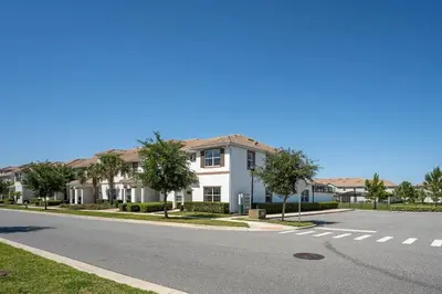 an empty street in front of a house at Casa 5Q c/ Piscina Privativa - Storey Lake Resort in Kissimmee