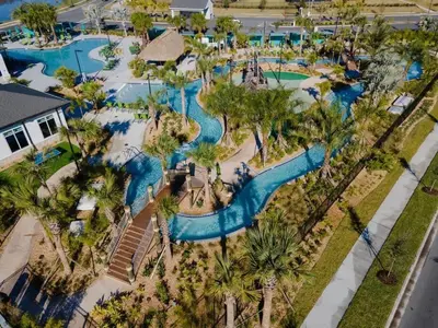 an aerial view of a pool at a resort at Casa 4Q c/ Piscina Priv. no Storey Lake in Kissimmee