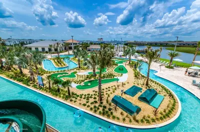 an island in the water at a resort at Let's Glo Now Adventure Cove Villa townhouse in Kissimmee