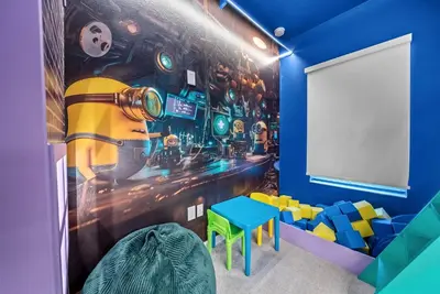 a childs room with a bar mural at Brand NEW 5 BRD At Paradiso Grande Near Sea World in Orlando