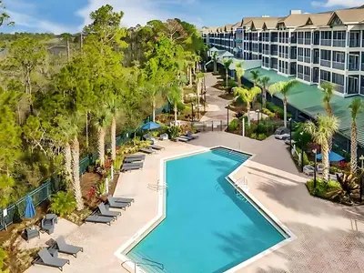 an aerial view of the pool at the resort at Modern 3BR Resort Condo with Pool near Disney in Orlando