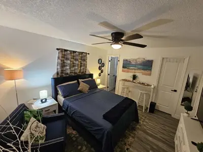 a bedroom with a bed and a ceiling fan at Private 1 Bedroom Suite Near Orlando Attractions in Orlando