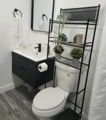 a bathroom with a toilet and a sink at Private 1 Bedroom Suite Near Orlando Attractions in Orlando