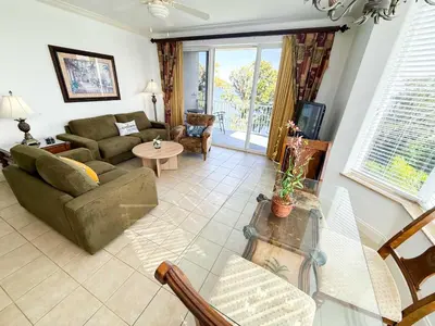 a living room with a couch and a table at BHBR207 - Condo Close to Disney - 1 mile in Orlando