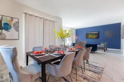 a dining room with a table and chairs at Amazing 6BR at Storey Lake next to Disney - 2835 in Kissimmee