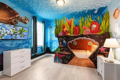 a childs room with a ocean themed bedroom at Home With Movie Theater, Game & Theme Room Near Disney With Resort & Waterpark Access - 7621Wi in Orlando