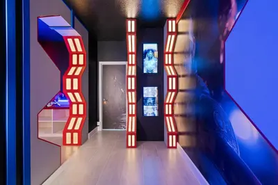 a hallway with red and white lights in a room at Themed 15BR Mansion - Near Parks in Kissimmee