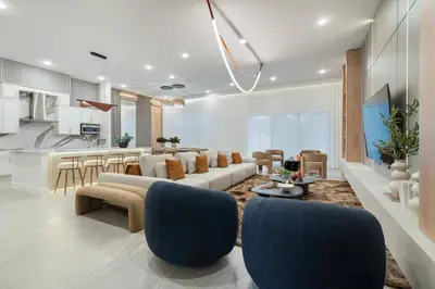 a living room with a couch and a table at Themed 15BR Mansion - Near Parks in Kissimmee