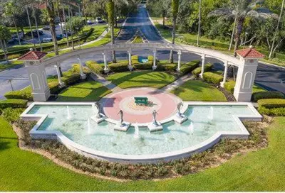 an aerial view of a pool in a park at 648 - Spacious 6-Bedroom Emerald Island Retreat with Pool, Spa & Games Room Near Disney in Kissimmee