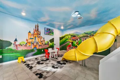a room with a disney castle mural on the wall at 4177 Paragraph Drive in Kissimmee