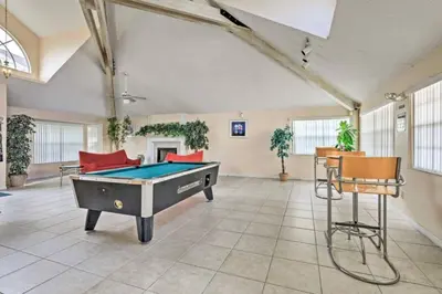 a large room with a pool table in it at Villa at Laguna Bay in Kissimmee