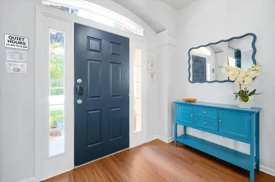 a blue cabinet in a room with a blue door at Themed Villa with Private Pool, Game Room, Resort Amenities, BBQ in Orlando
