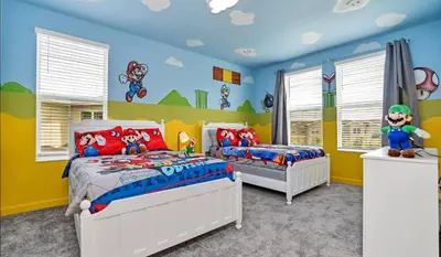 two beds in a room with yellow and blue walls at Pool & BBQ | Disney-Themed Cozy 6BD | Near Disney in Kissimmee