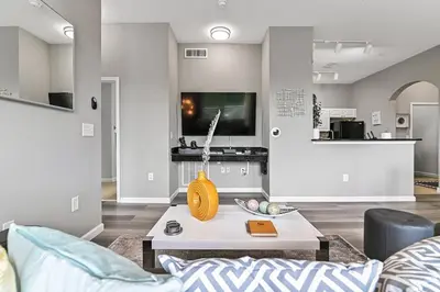 a living room with a couch and a table at Sunset every single day ReserveView 4BRElevator in Kissimmee