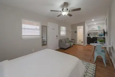 a bedroom with a bed and a ceiling fan at Studio in the heart of Orlando in Orlando