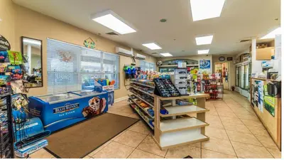 a store aisle of a convenience store at Windsor Hills Resort in Orlando